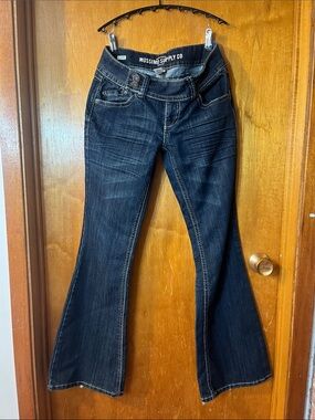 Woman’s Mossimo Supply Co. Dark Blue Flared Jeans 7 (Fit 6)